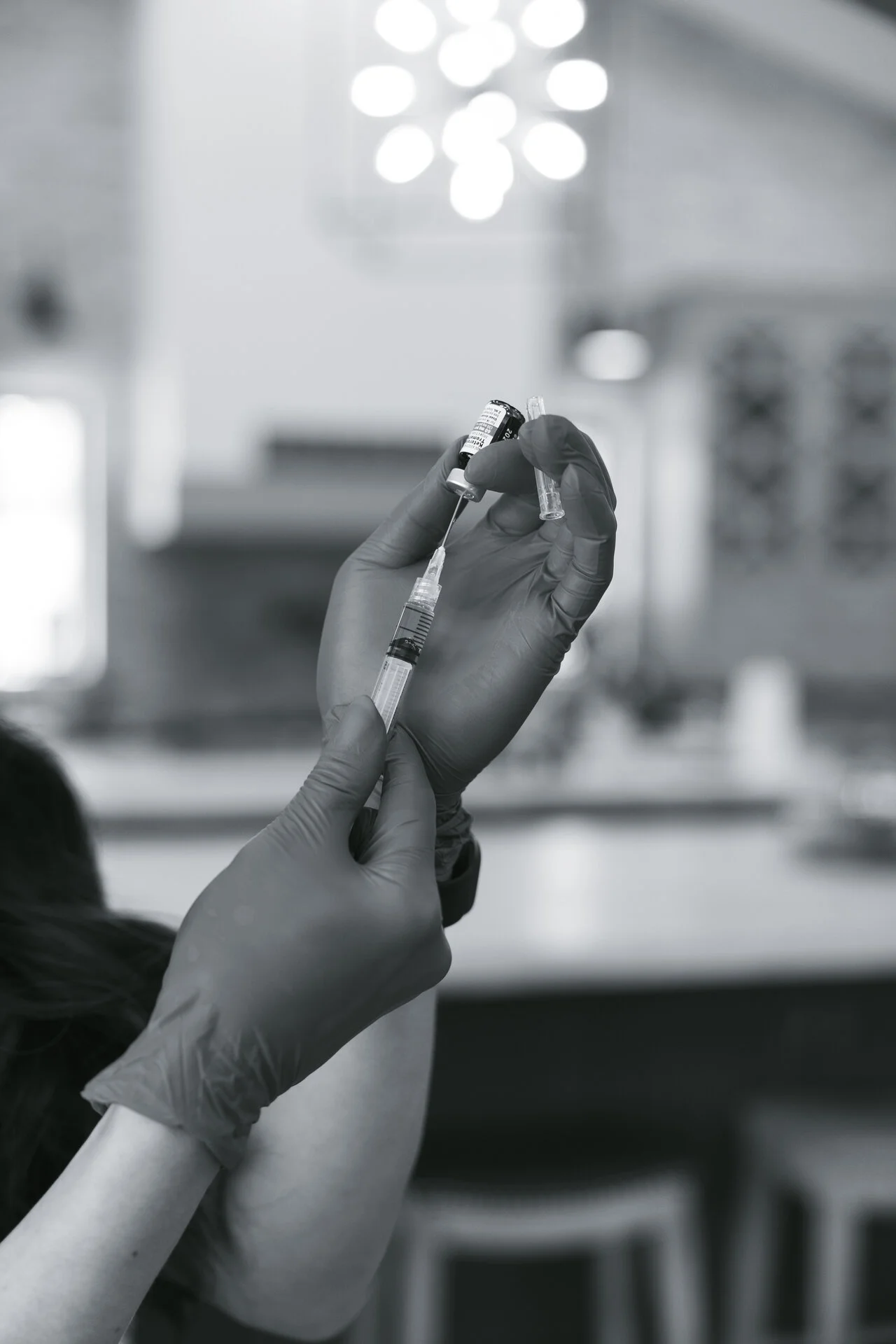 Registered nurse preparing vitamin C IV drip in Phoenix