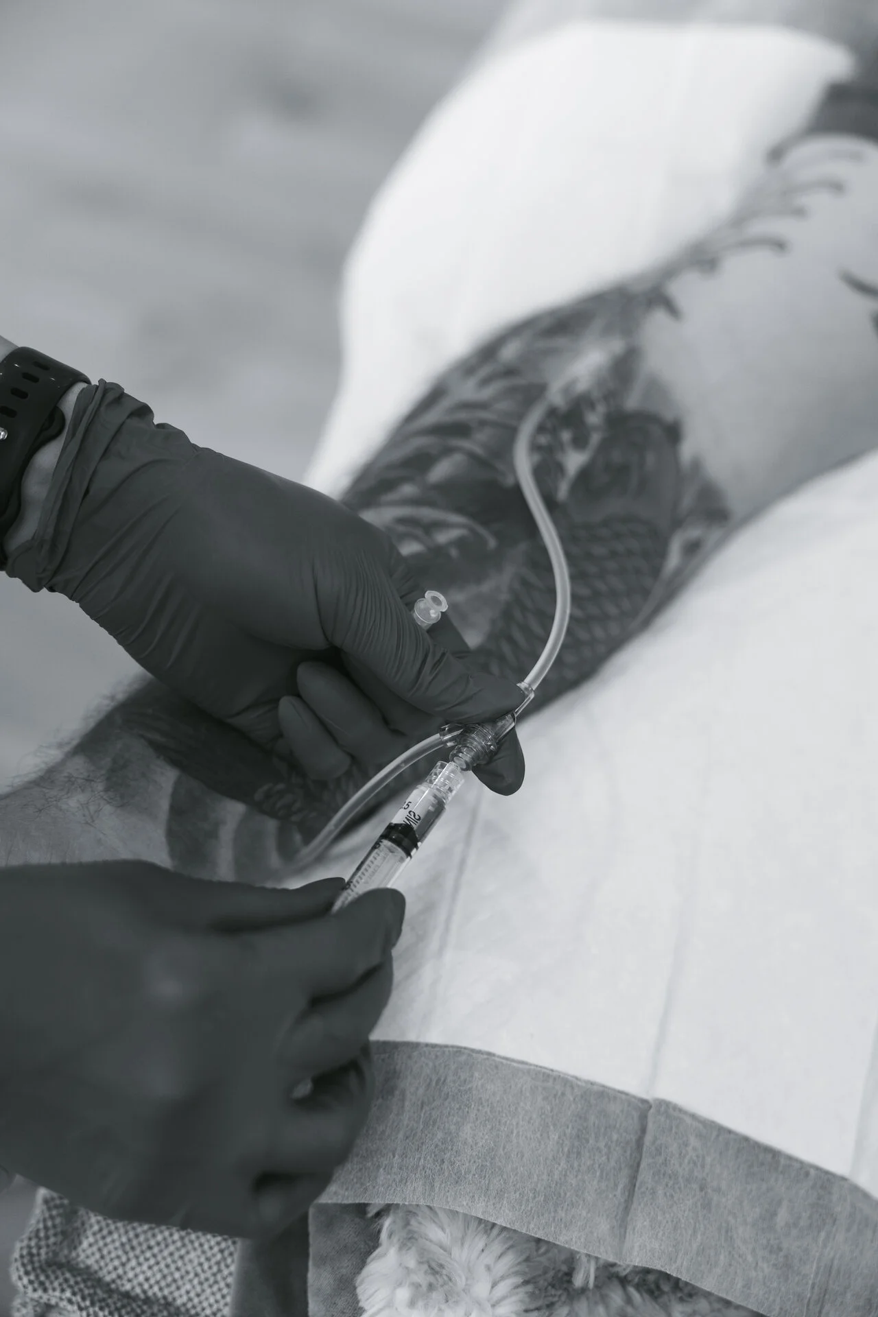 IV Revival nurse discussing wellness IV packages with client in Phoenix