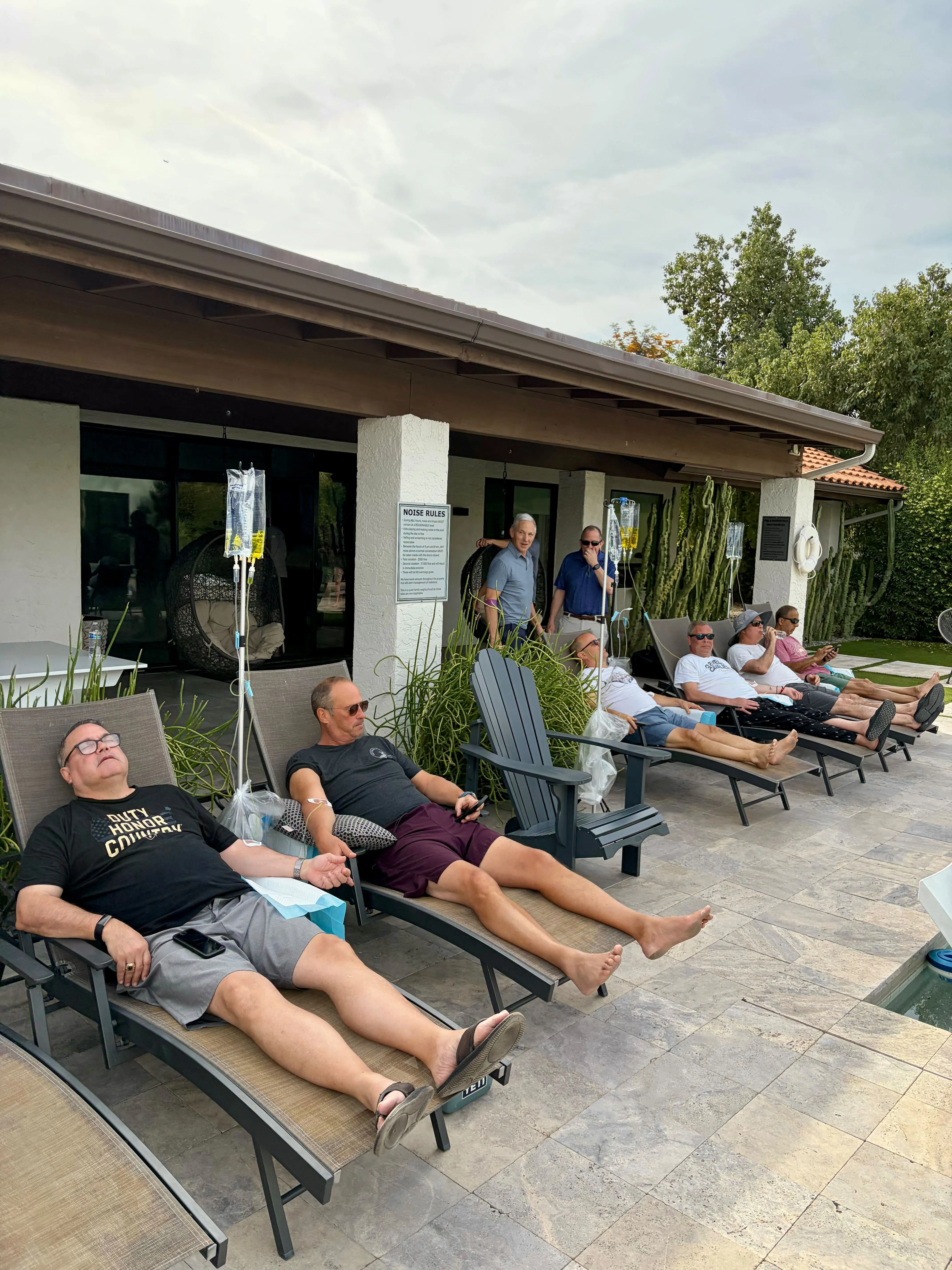 Group of golfers receiving IV recovery therapy at Scottsdale resort