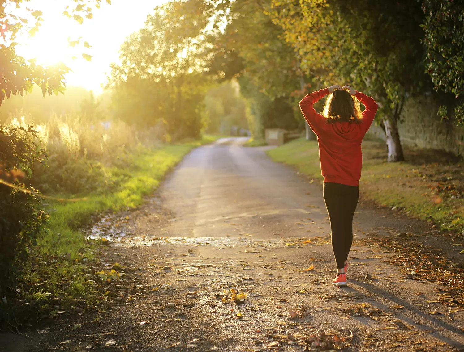 A photo of a healthy woman on a walk after an IV treatment in Arizona